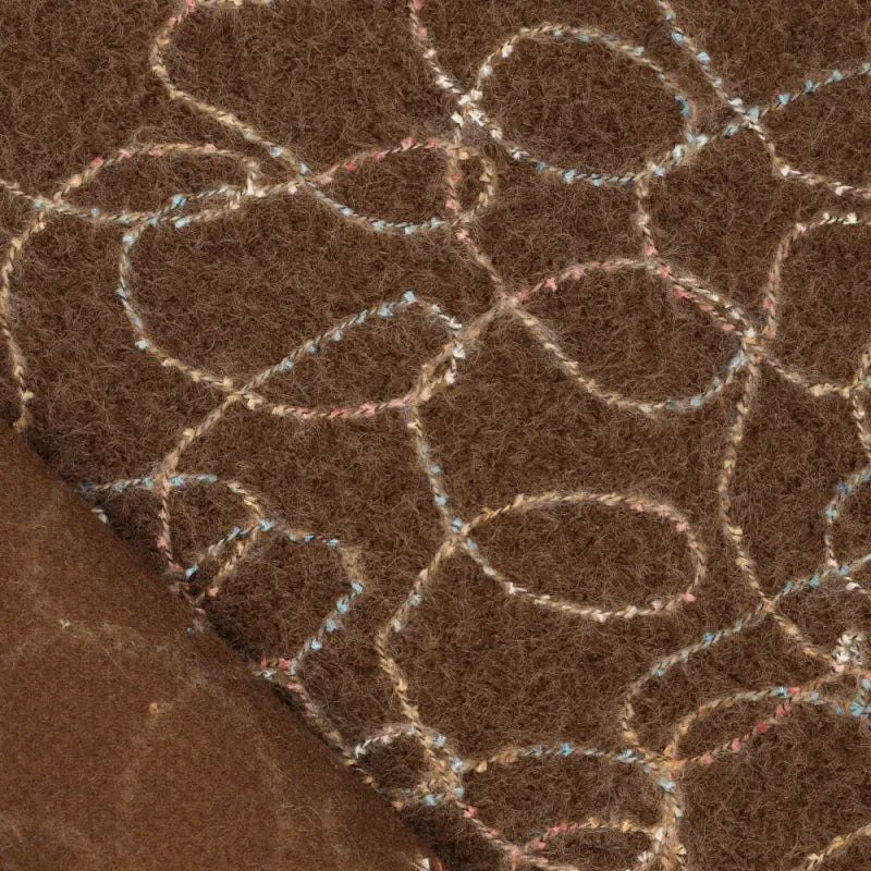 Mantelstof geborduurde swirls bruin
