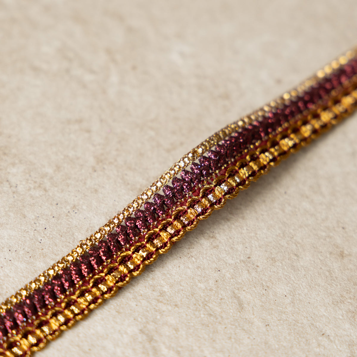 Galonband goud/burgundy 17mm