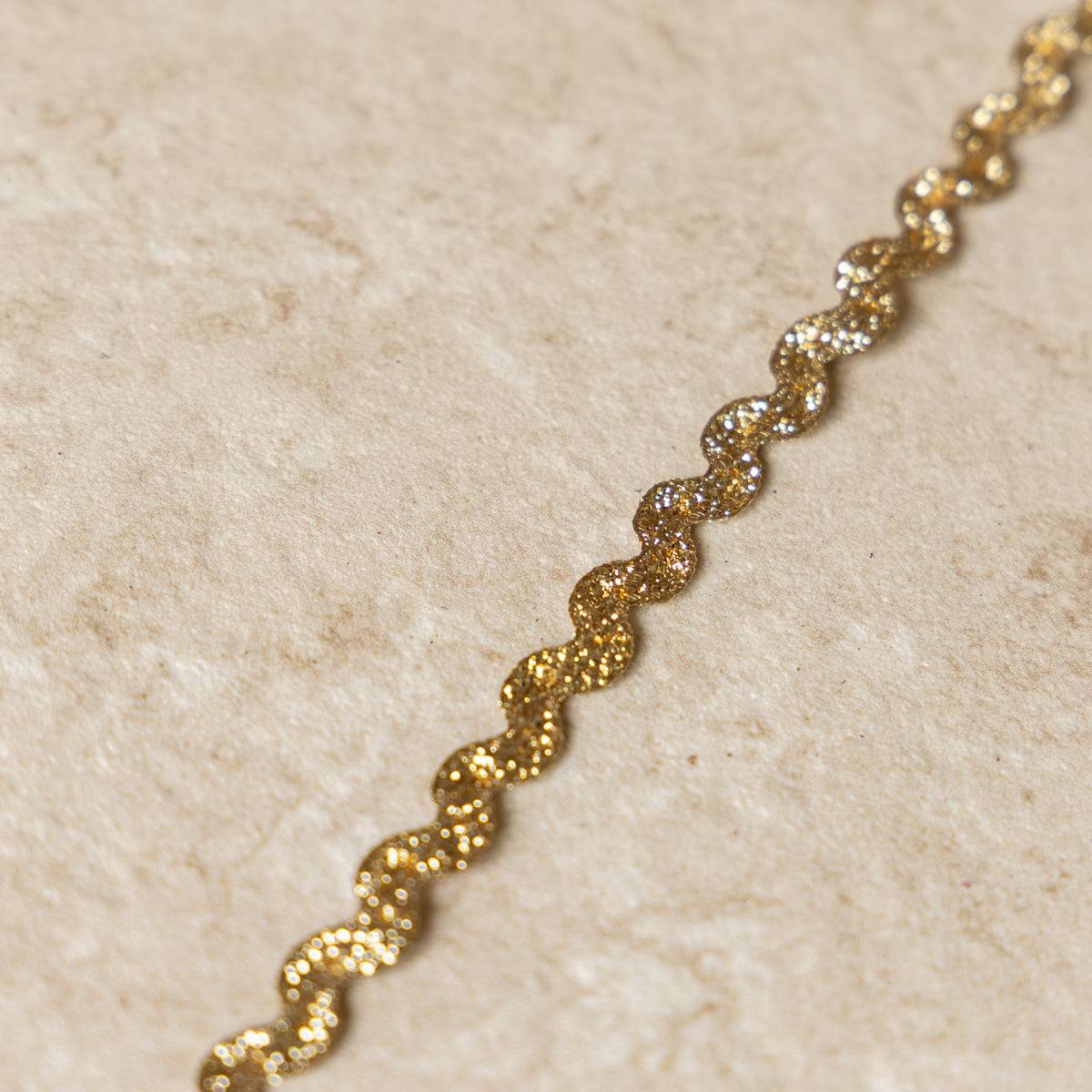 Zigzagband goud 7mm
