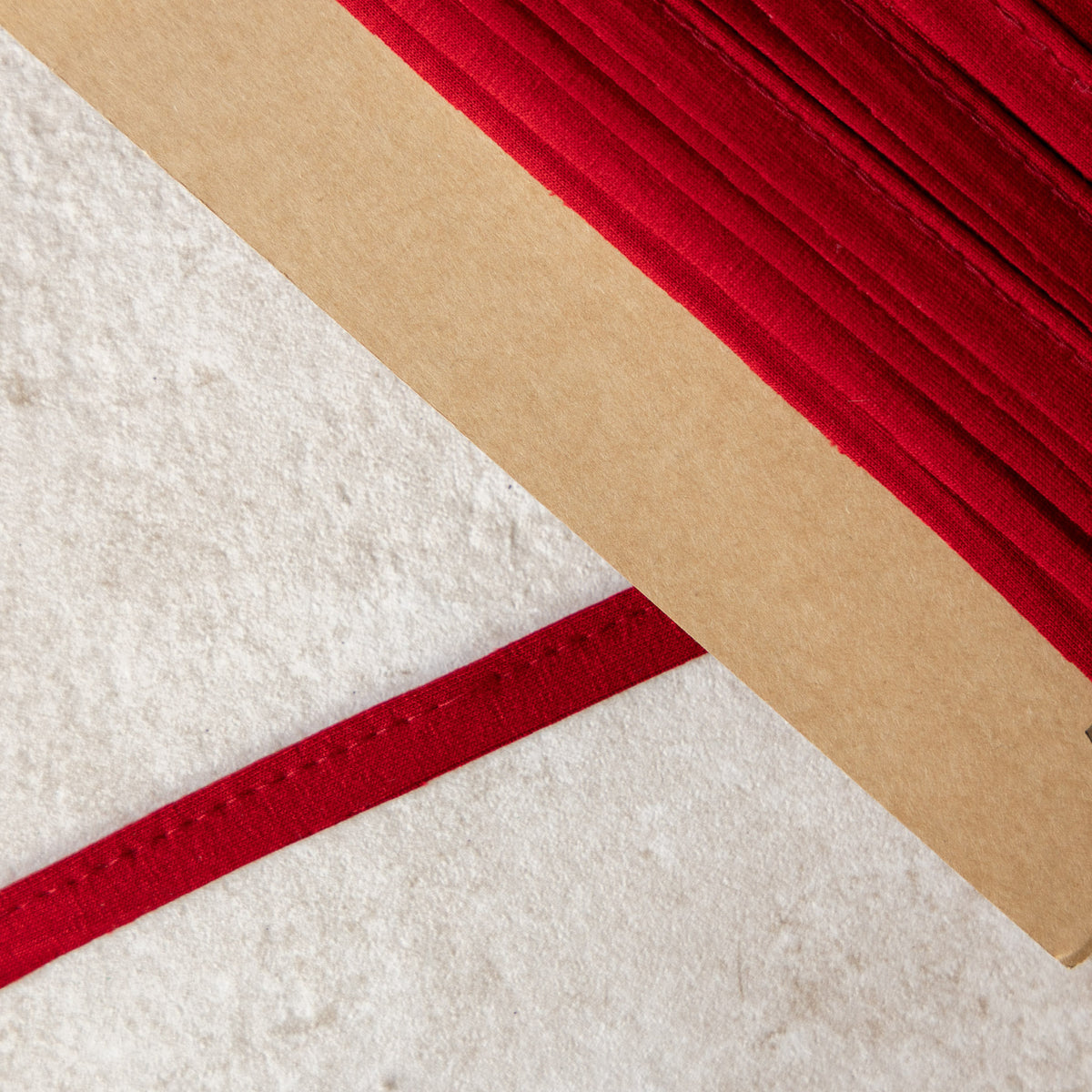 Paspelband jersey 3mm donkerrood (600)