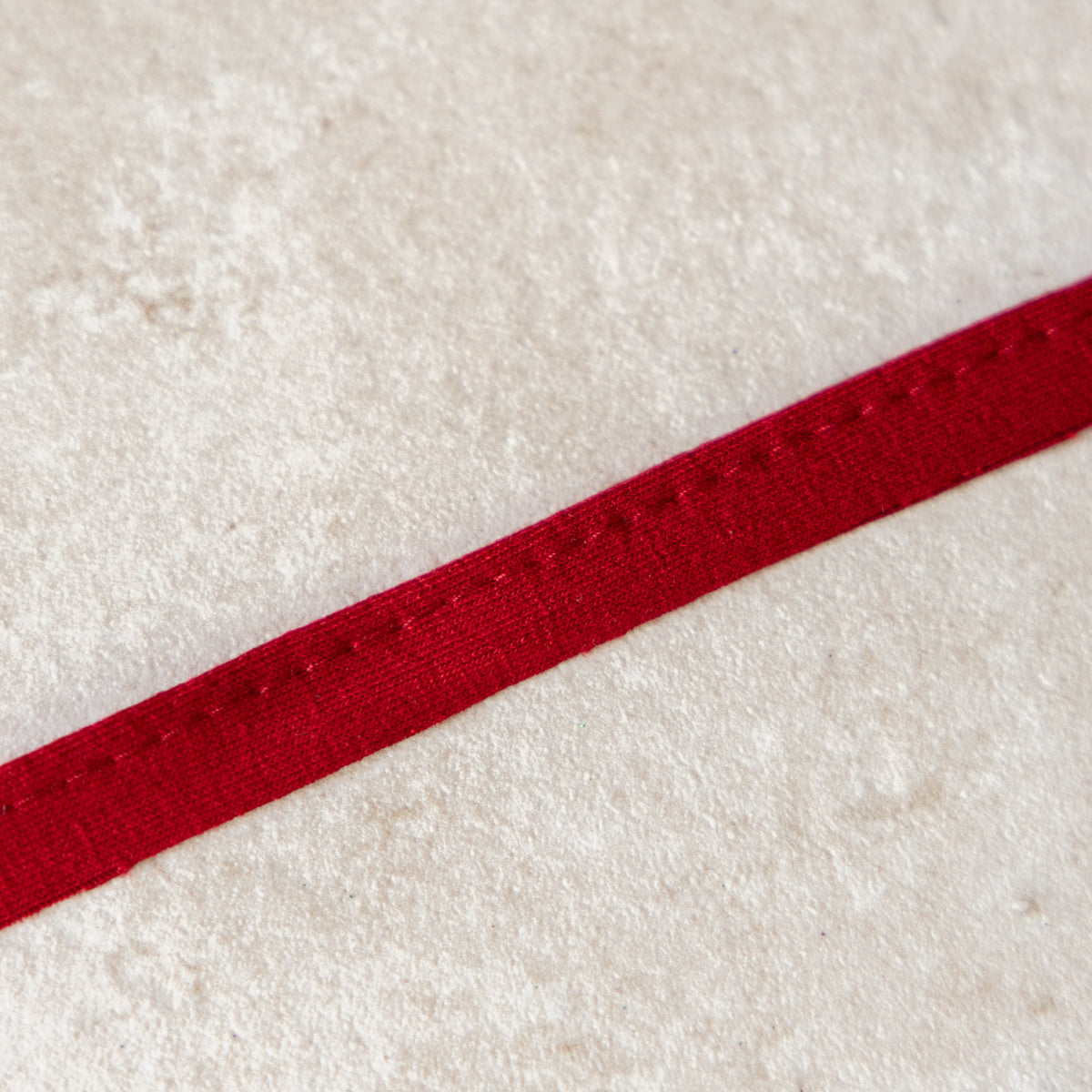 Paspelband jersey 3mm donkerrood (600)