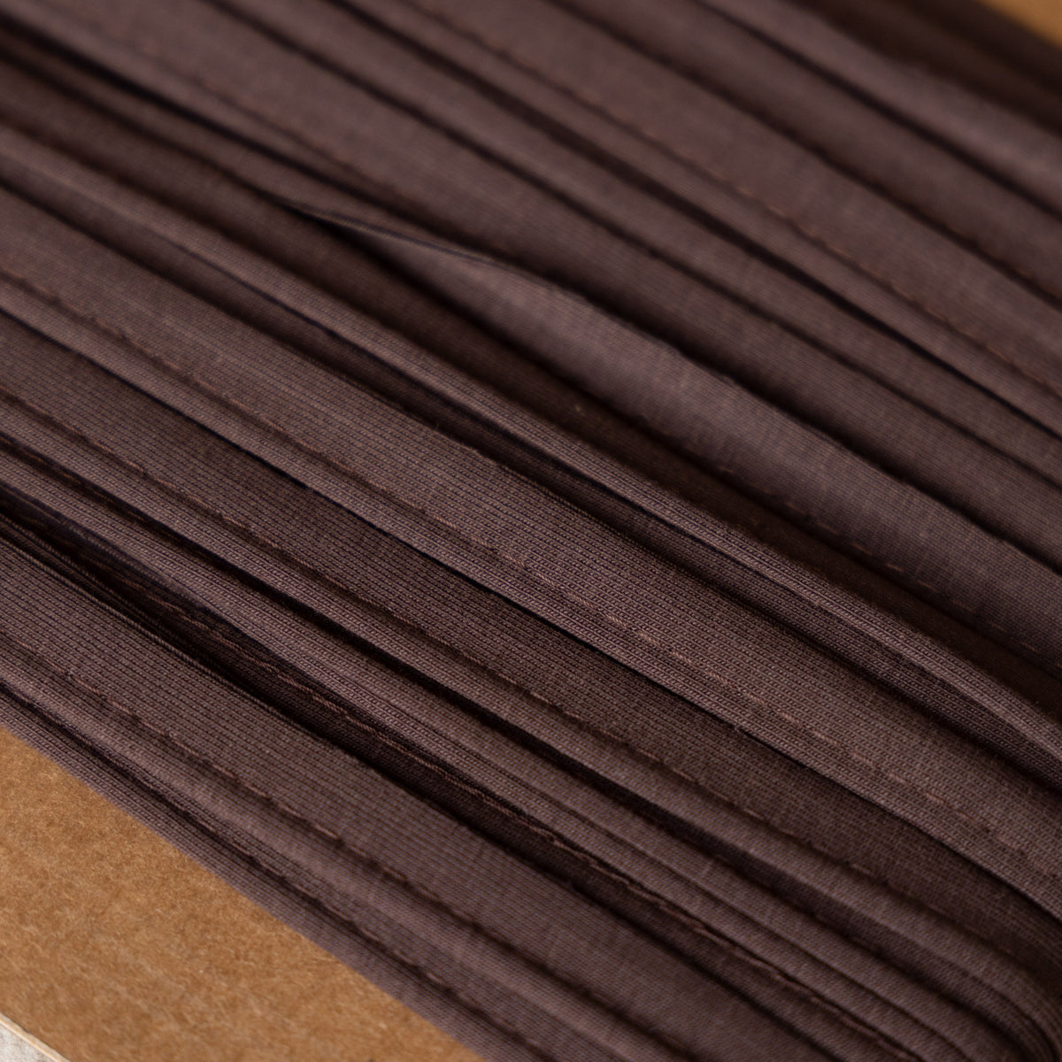 Paspelband jersey 3mm donkerbruin (501)