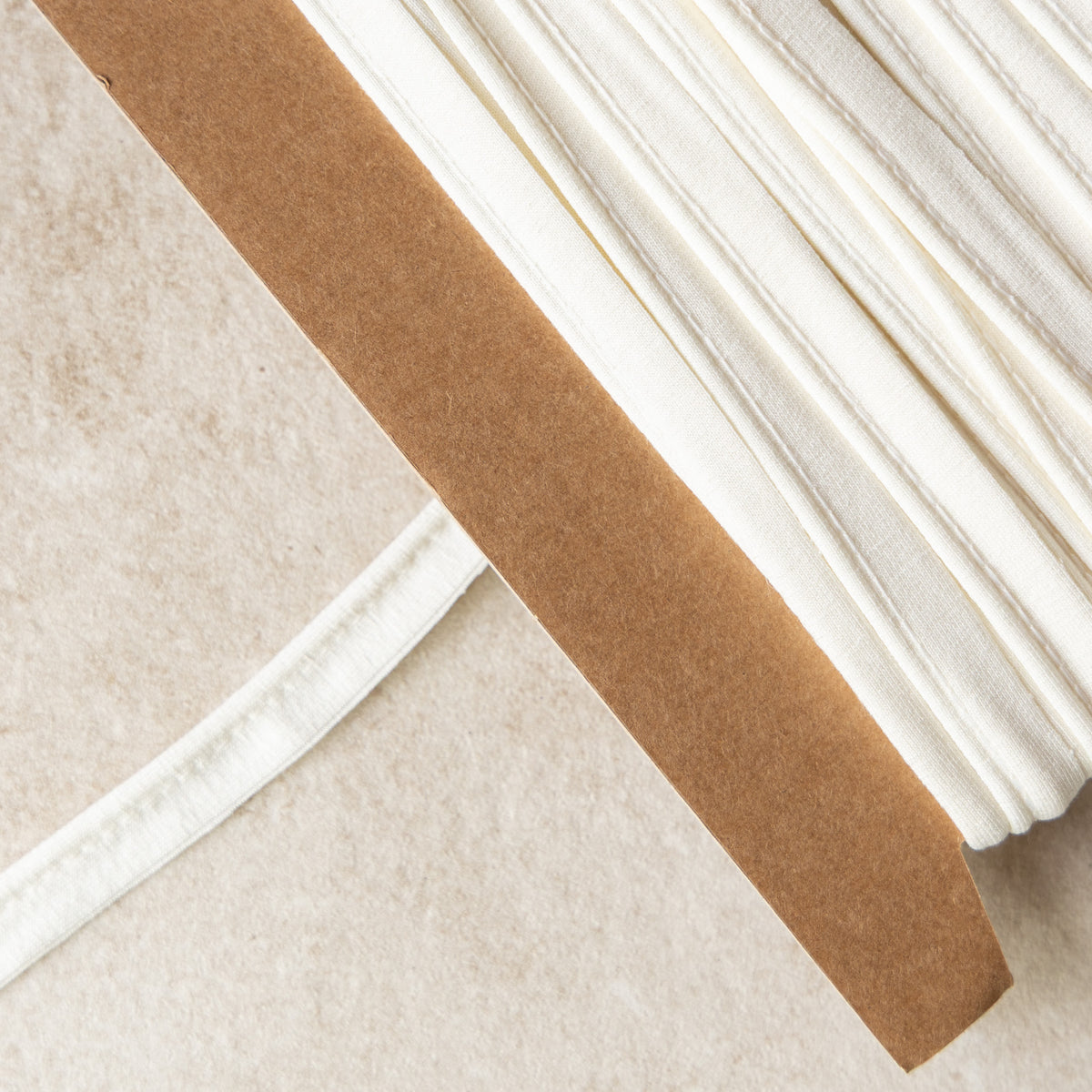 Paspelband jersey 3mm offwhite (320)