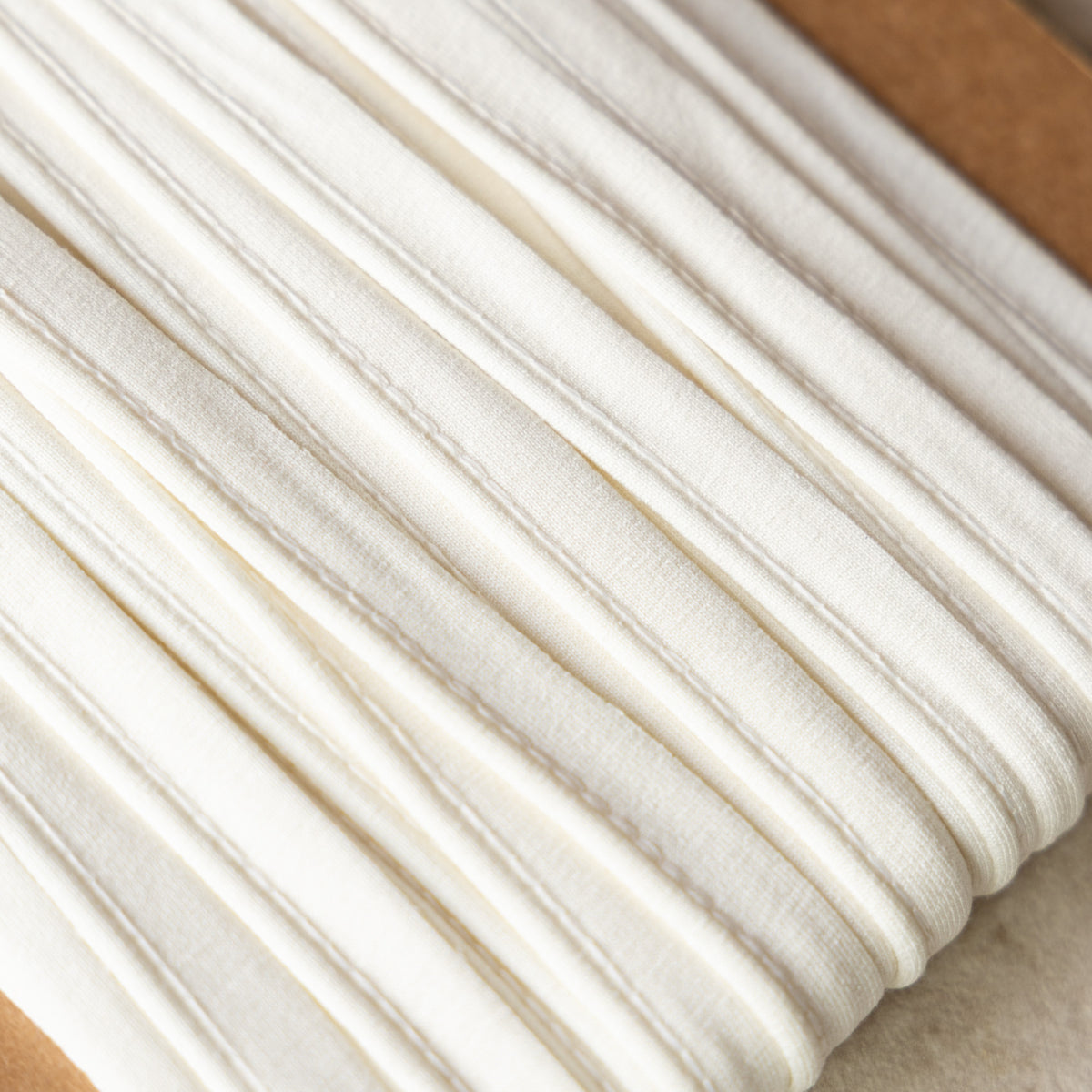 Paspelband jersey 3mm offwhite (320)