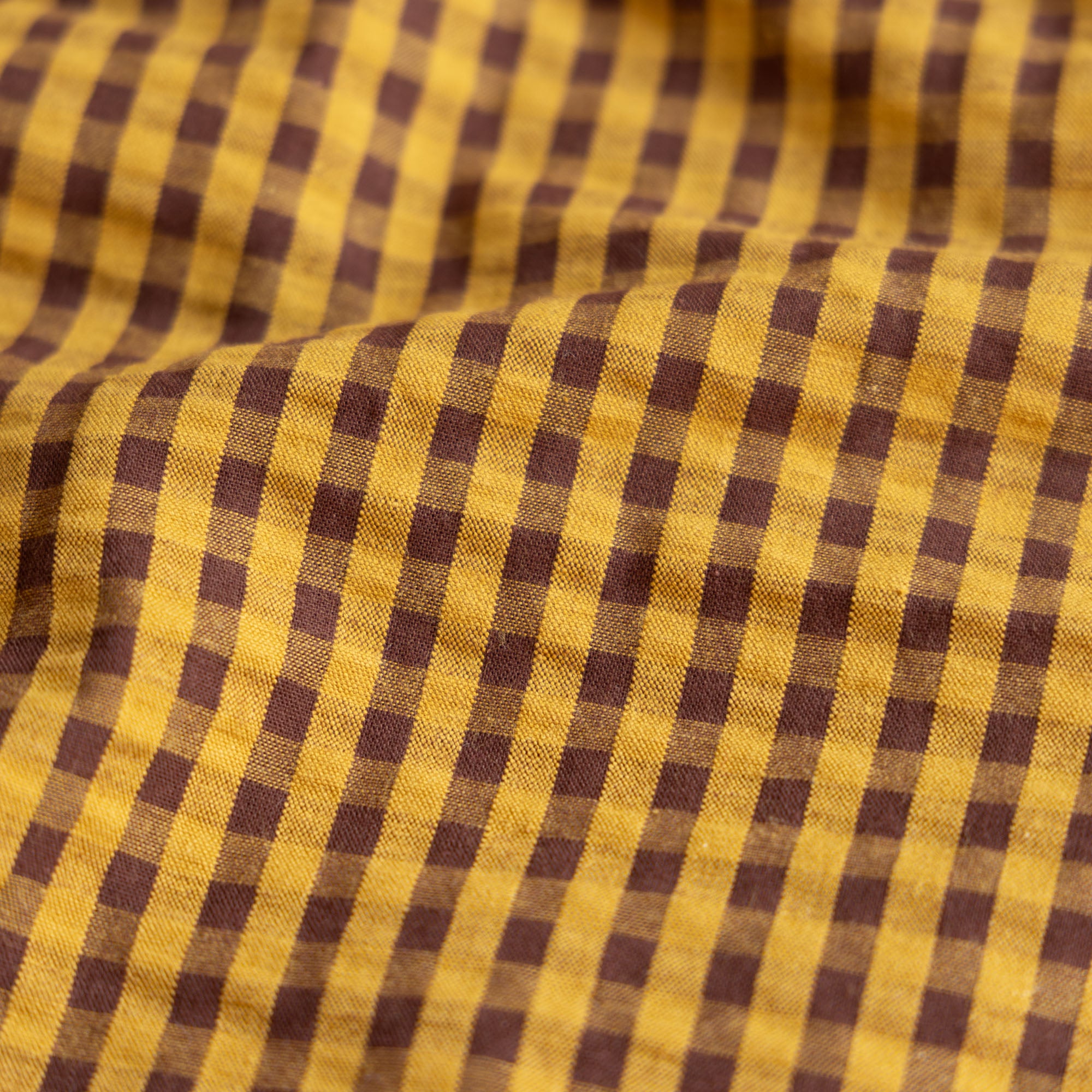 Seersucker ruit cacao/oker