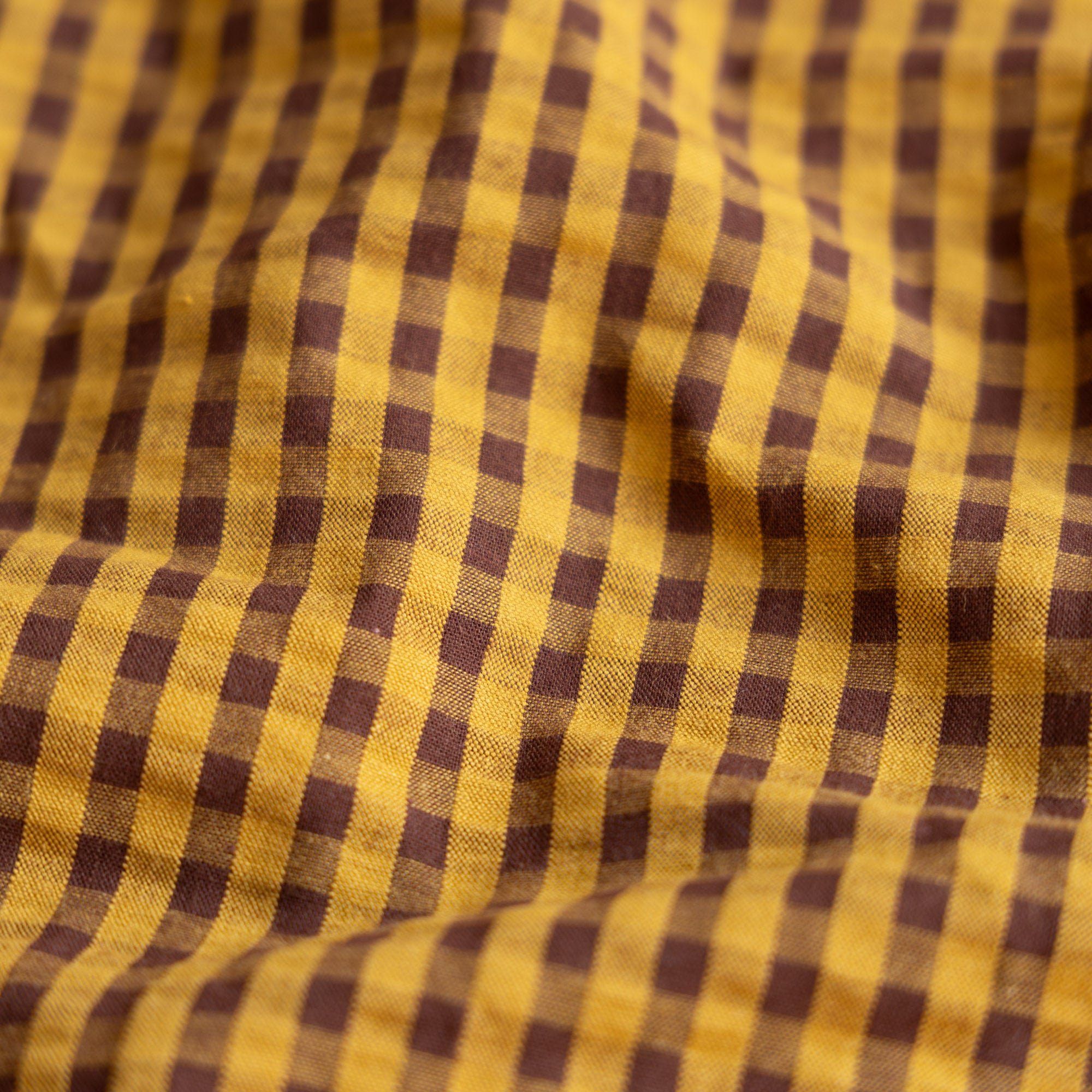 Seersucker ruit cacao/oker