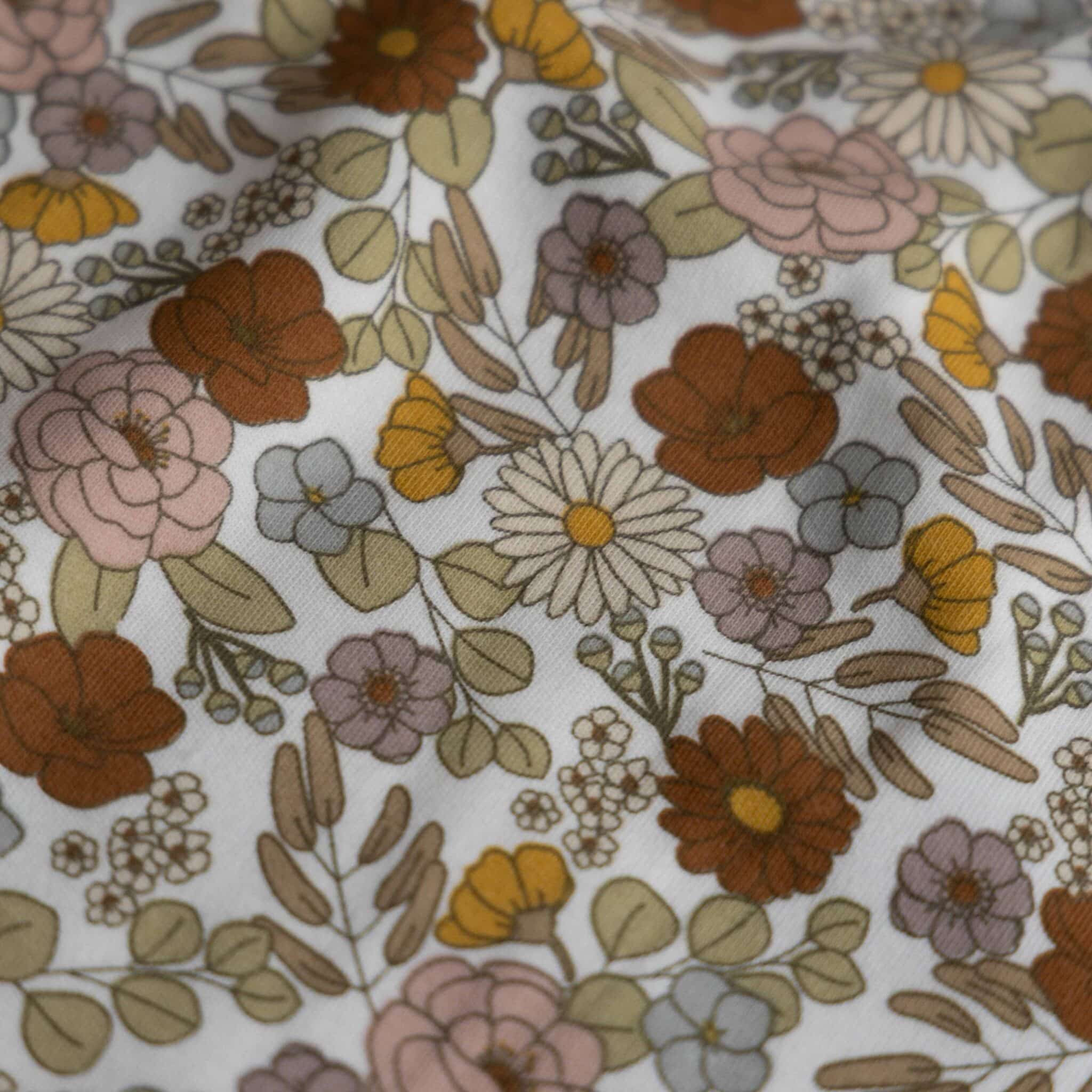 Coupon 150cm jersey gekleurde bloemen