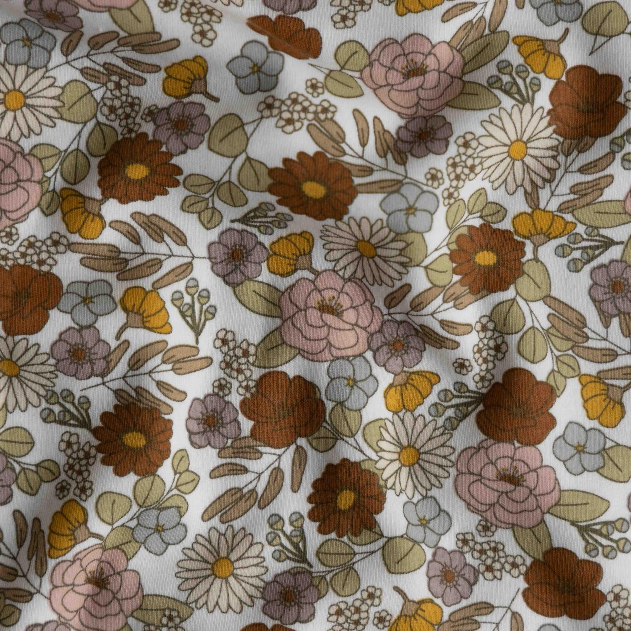 Coupon 150cm jersey gekleurde bloemen