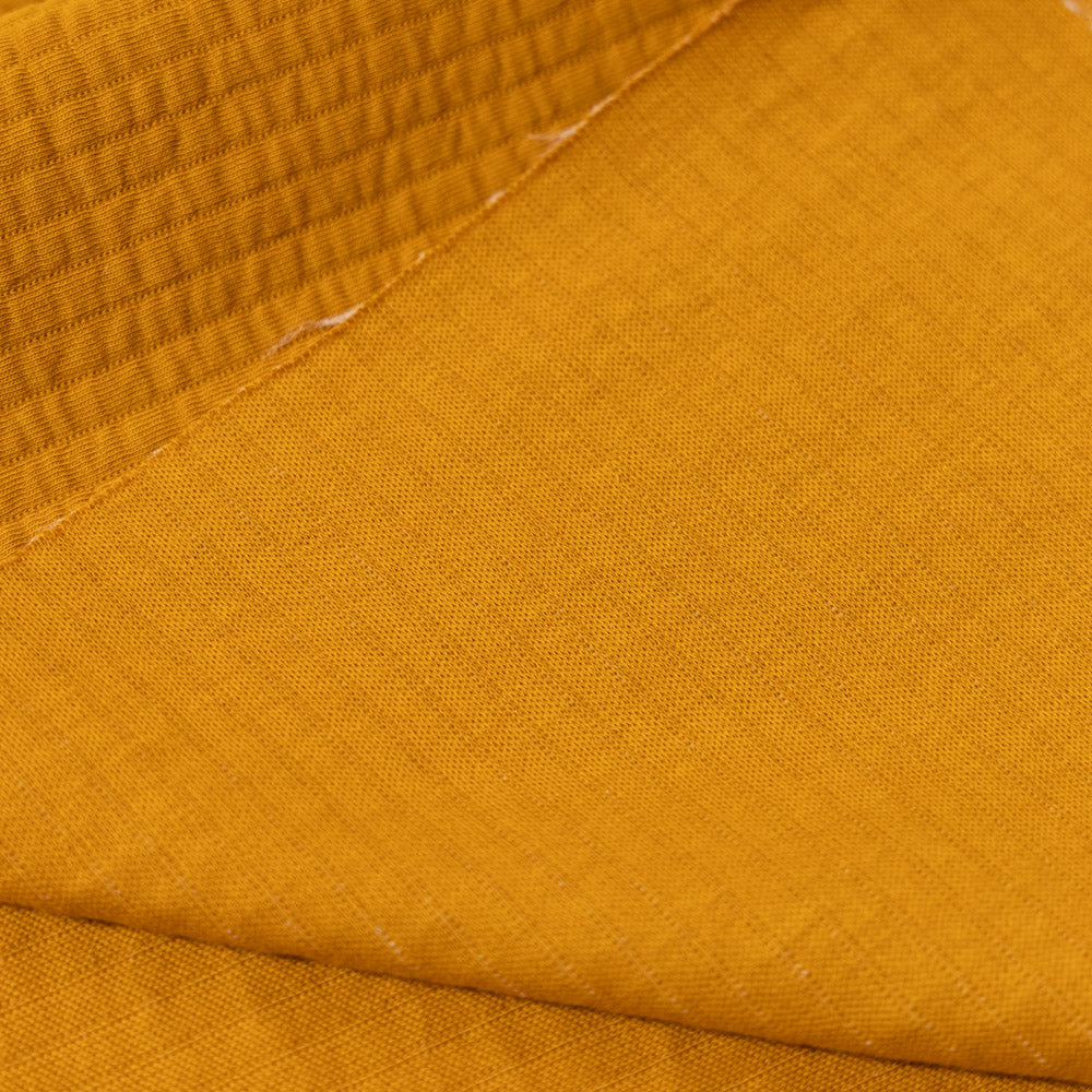 Coupon 150cm quilted jersey oker