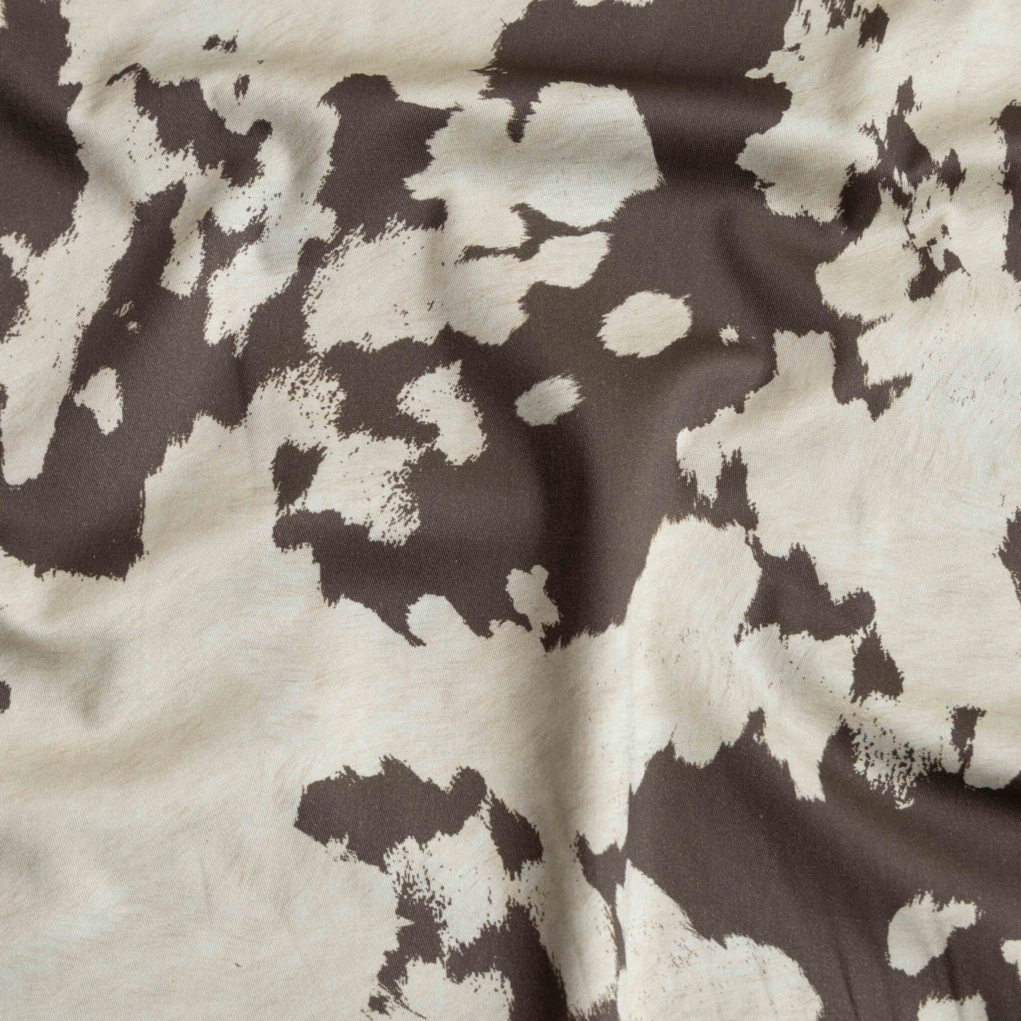 Geweven stretch katoen koeienprint