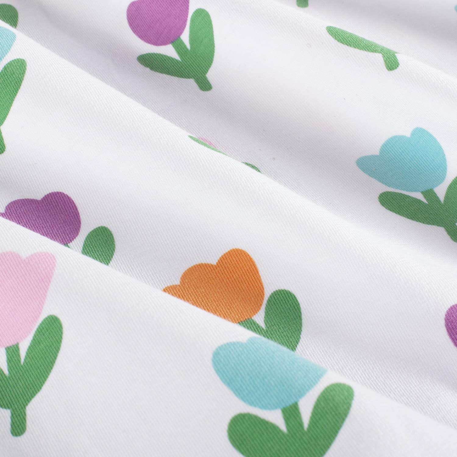 Jersey vrolijke bloemen wit