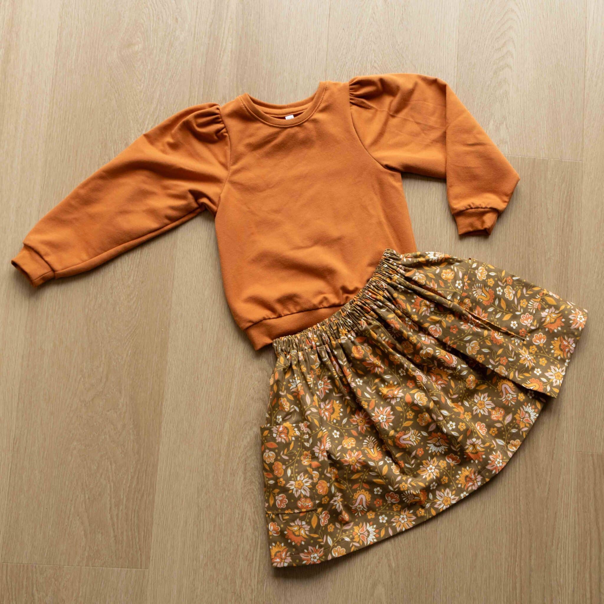 Katoen bloemen mosgroen/oranje