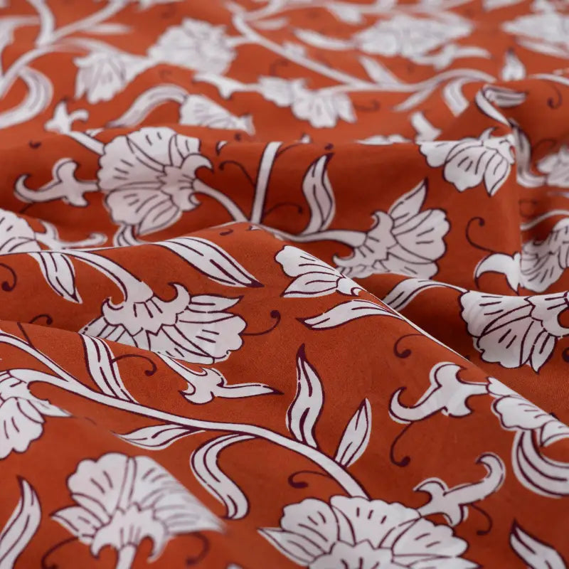 Katoenen voile witte bloemen cognac