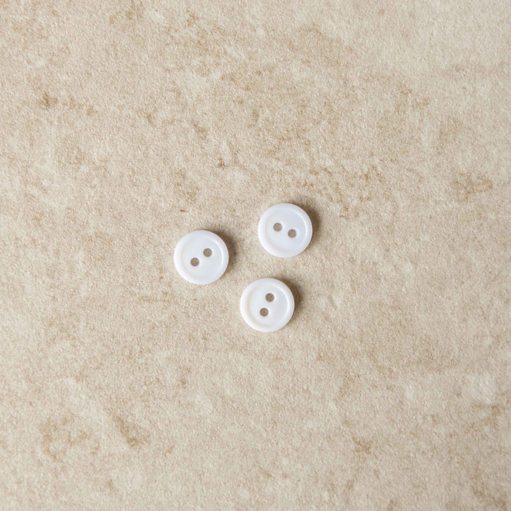 Knoop offwhite rand 12mm