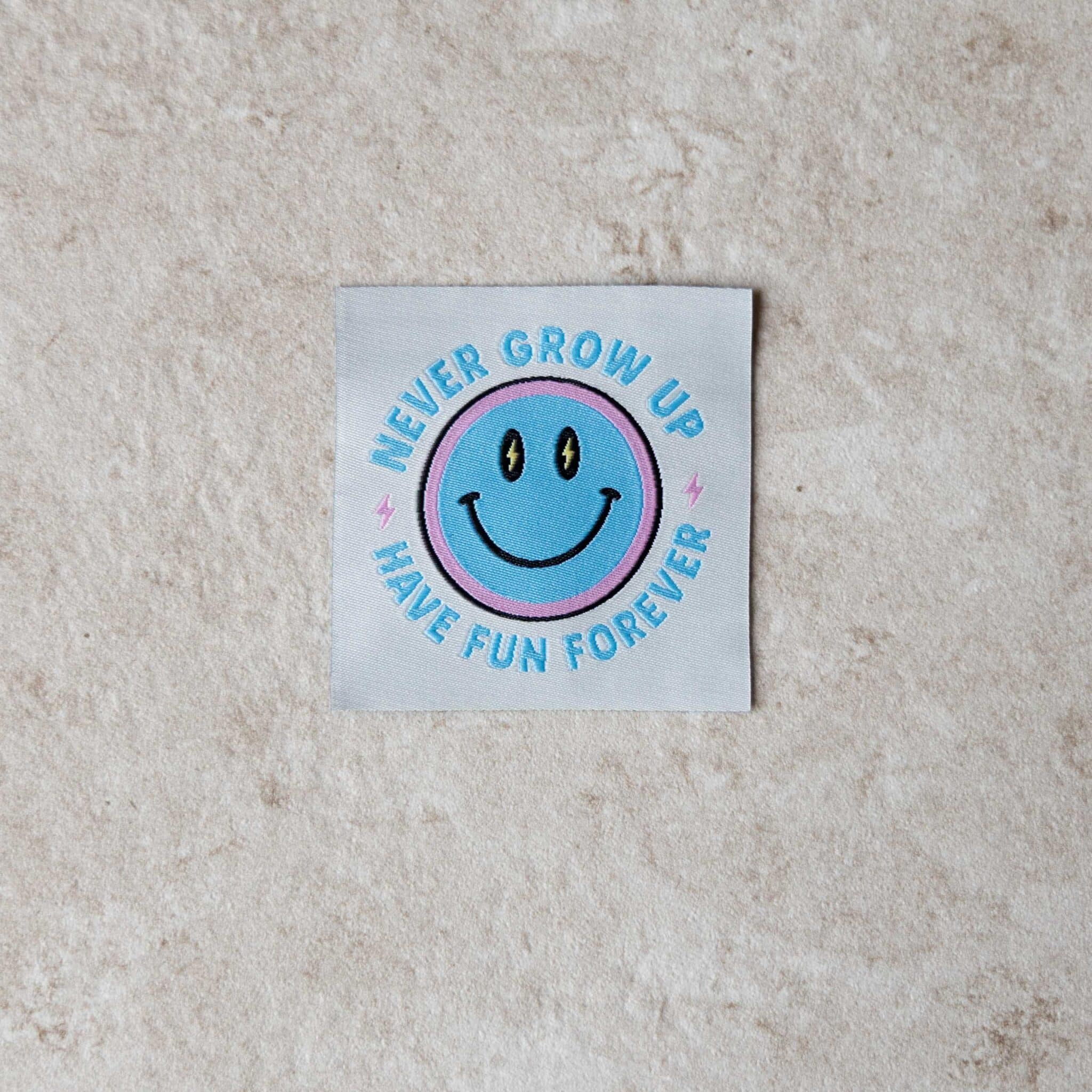 Loop&amp;Label - Never grow up smiley - XXL label