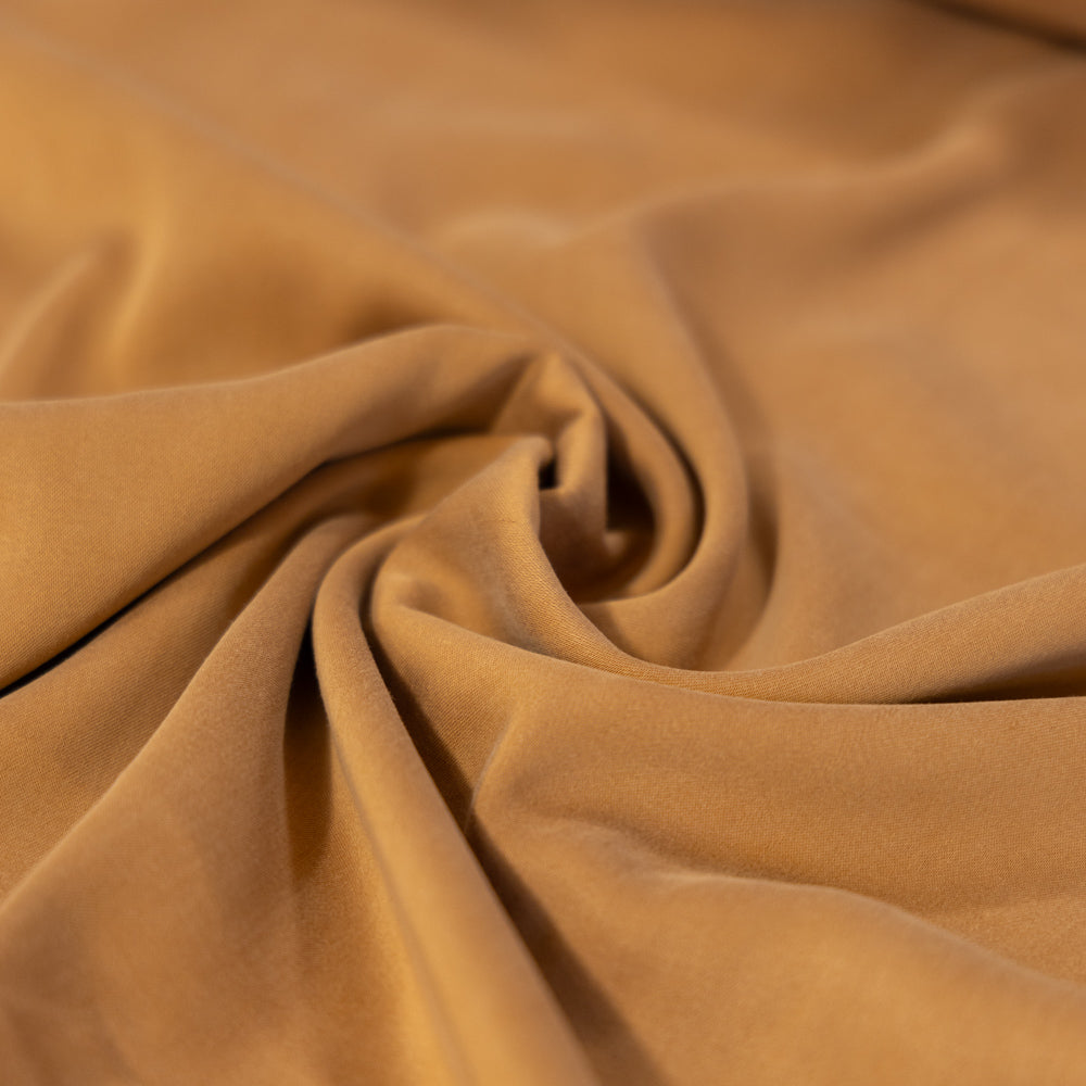 Lyosand stretch goudbruin