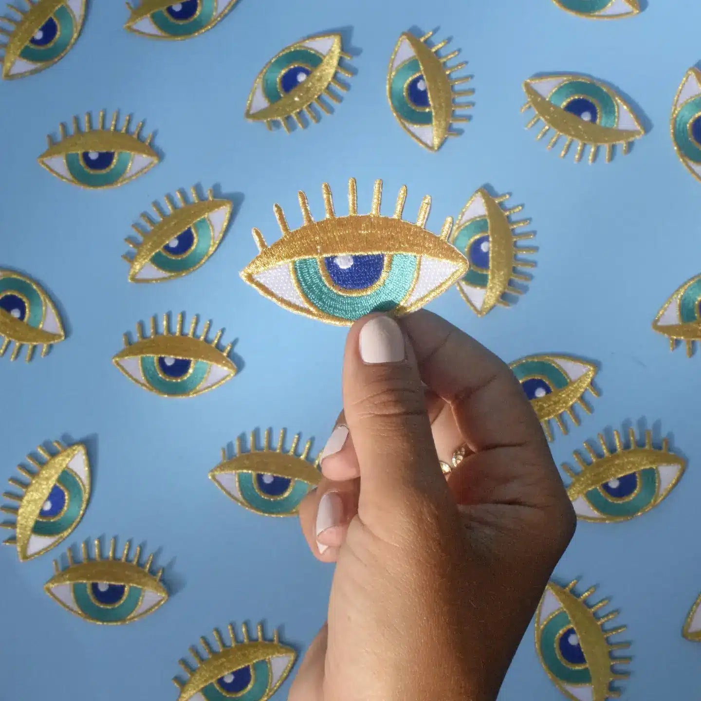 Malicieuse - strijkapplicatie gouden oog