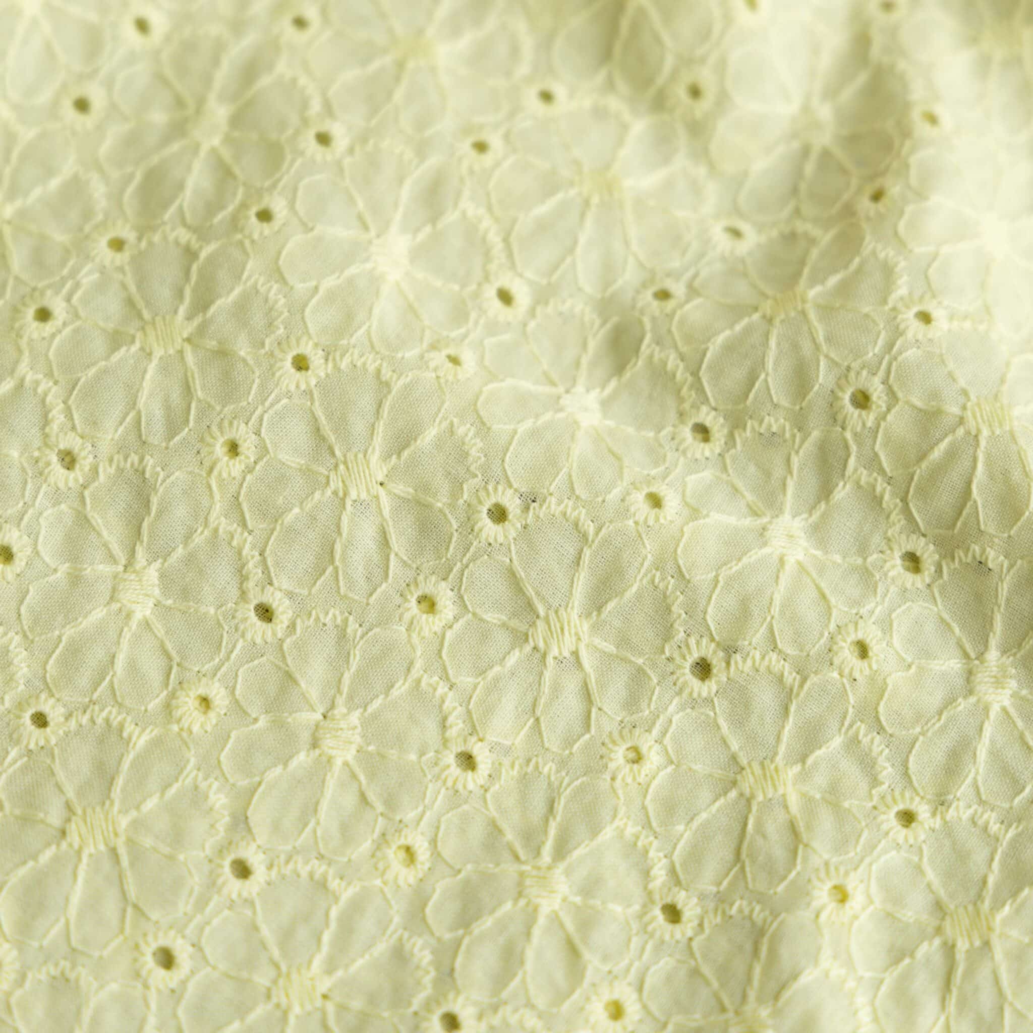 Poplin broderie bloemen schulprand geel