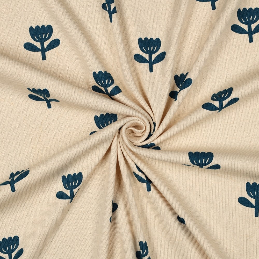 Rib jersey organic bloemen naturel/petrol (verkleuring stofvouw)