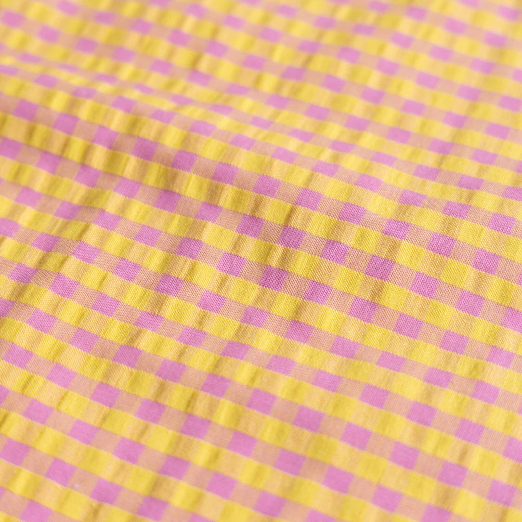 Seersucker ruit geel/roze