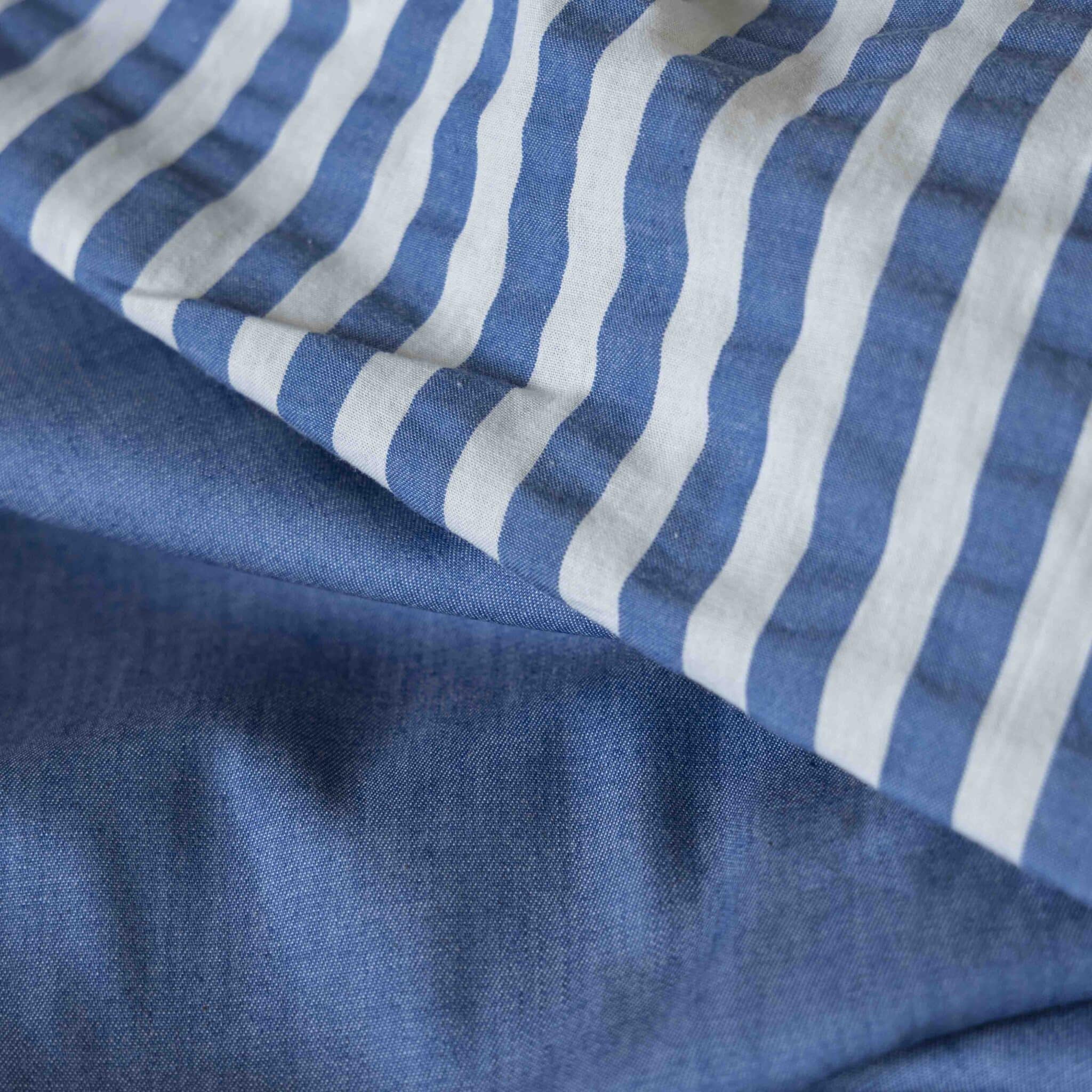 Seersucker strepen blauw/offwhite